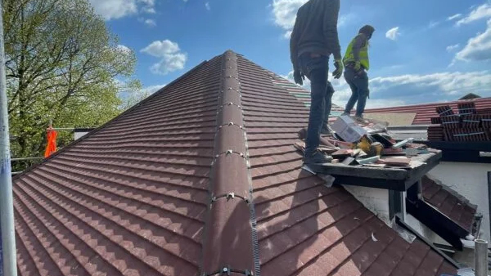 Our team at work re-roofing a property in Dorset.