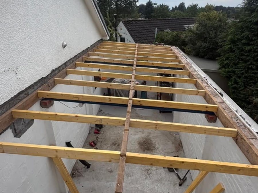 New timber joists in place during building work.