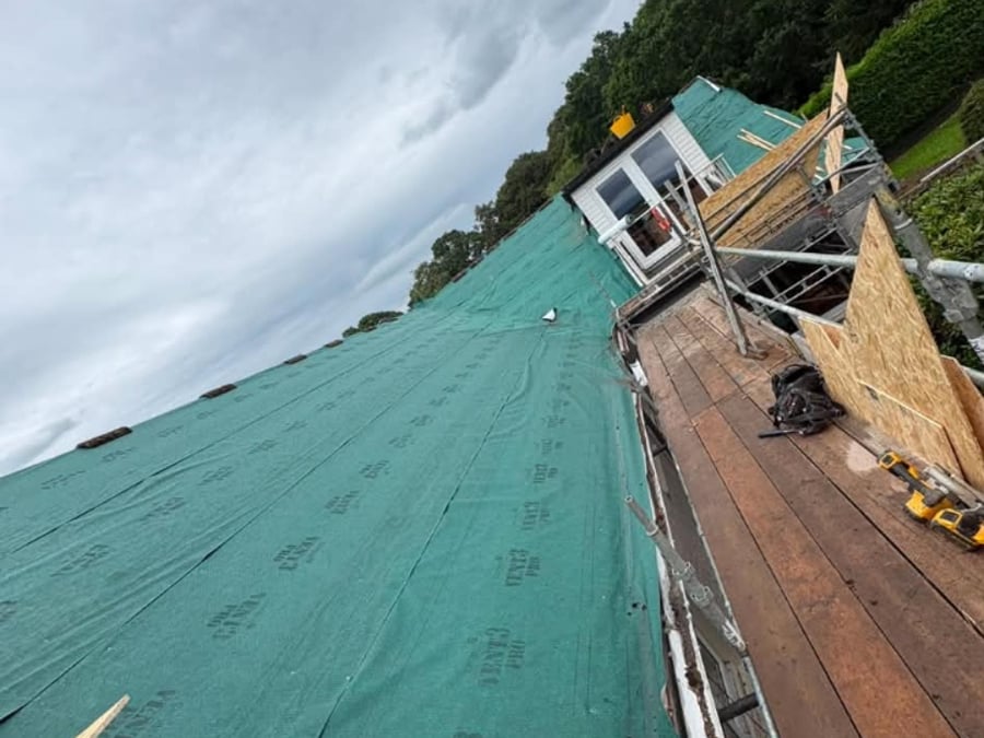 Breathable membrane and decking laid during a re-roof.