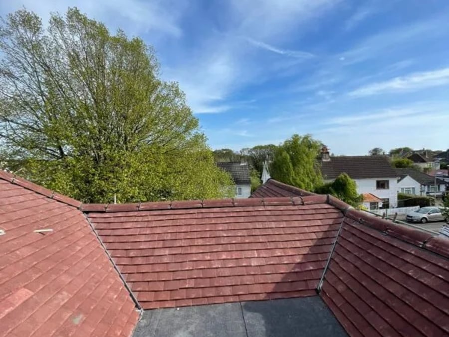 Tiled valley with flat roof section completed.